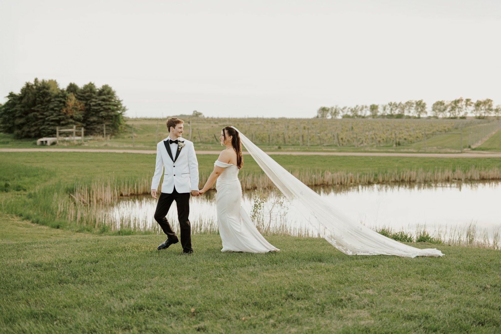 Wedding couple running and laughing together Wedding couple running and laughing together