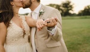 Wedding couple pinky promise with rings
