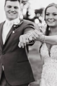 Wedding couple pinky promise with rings