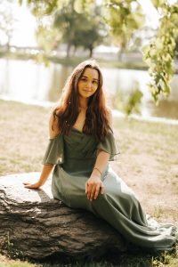 Senior Photo of Girl in Dress on a Rock