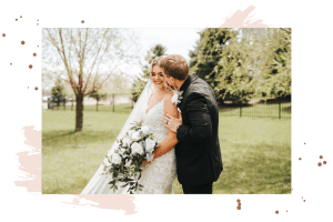 Groom kissing bride's cheek