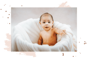 Baby sitting in a basket