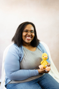 Branding photo of business women holding crochet duck