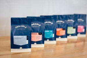 Product photo of coffee bags lined up with the first in focus