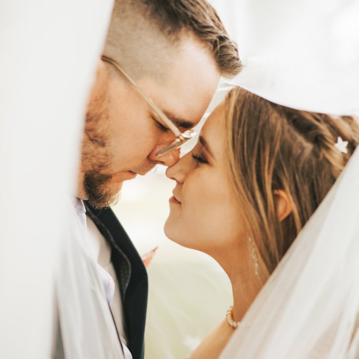 Wedding couple in veil