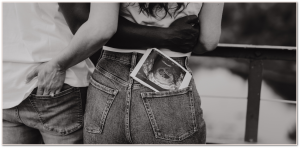 Ultrasound photo in the back pocket of maternity photo