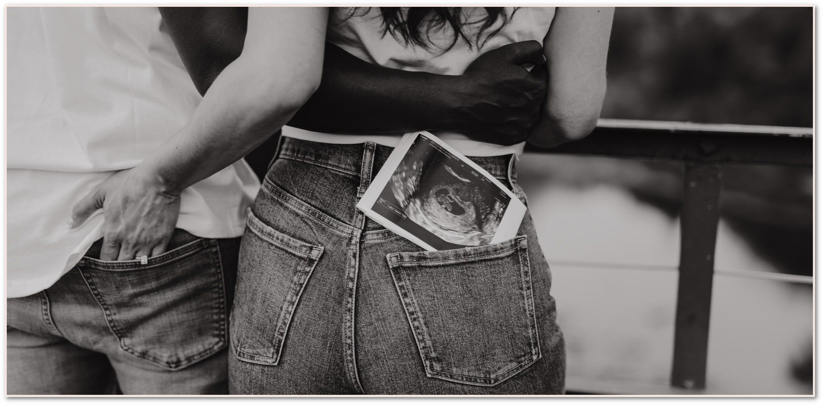 Ultrasound photo in the back pocket of maternity photo